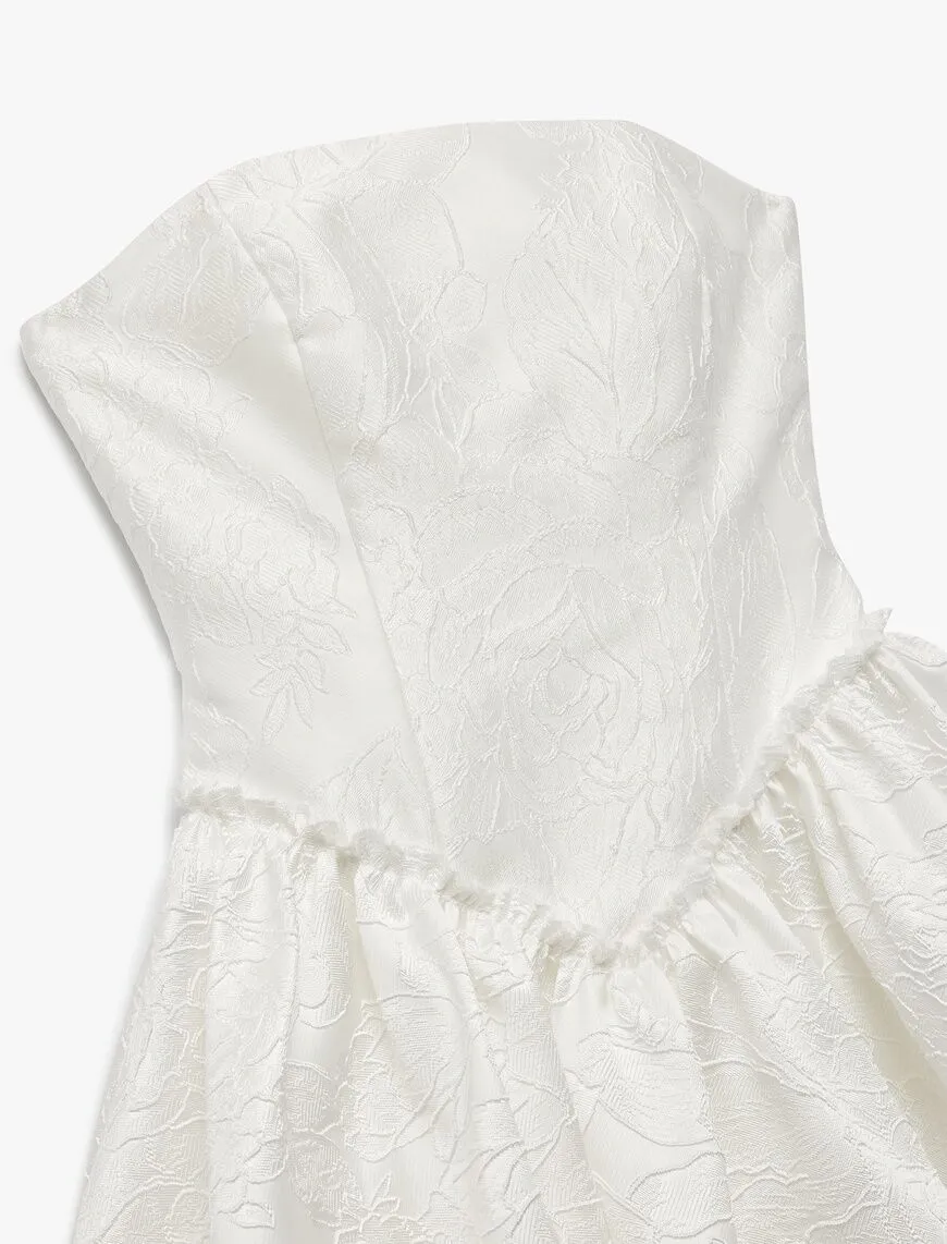 Closeup texture of white strapless dress